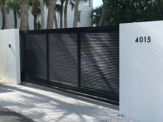 Black gate with house number 4015.